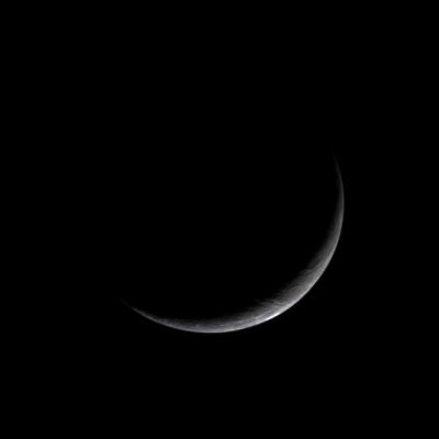 Crescent Enceladus, the brightest gem of Saturn's System
Caption NASA originale:"In the dim light of the outer Solar System, Cassini gazed back at Saturn's brightest gem: the moon Enceladus. The icy little world presents only a slim crescent in this natural color view. Cassini has now matched the best spatial resolution on Enceladus achieved by NASA's Voyager spacecraft, and will soon have excellent coverage of the moon (at more than 10 times the resolution in this image), following a flyby planned for February 17. 
When seen from its day side, Enceladus (499 Km across) has one of the brightest and whitest surfaces in the Solar System. Since it reflects most of the sunlight that strikes it, the temperature there remains at a chilly -200°C (-330° Fahrenheit). 
In this view, Cassini was pointed at the leading hemisphere of Enceladus, which was in darkness at the time. The image has been rotated so that north on Enceladus is up".
Parole chiave: Saturn's Moons - Enceladus