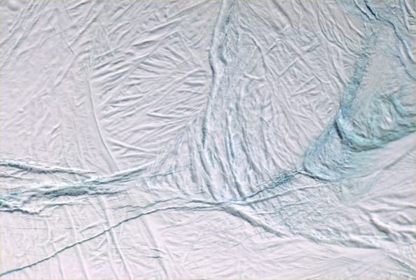 Enceladus (2) - detail mgnf and HR
The global mosaic of Enceladus was created from 21 false-color frames taken during the Cassini spacecraft's close approaches to Enceladus on March 9 and July 14, 2005. Images taken using filters sensitive to ultraviolet, visible and infrared light (spanning wavelengths from 338 to 930 nnmts) were combined to create the individual frames. 

The mosaic is an orthographic projection centered at 46,8° South Lat. and 188° West Long. and has an image scale of 67 mt (about 220 feet) per pixel. The original images ranged in resolution from 67 mt per pixel to 350 mt were taken at distances ranging from 11.100 to 6.300 Km from Enceladus.
Parole chiave: Saturn's Moons - Enceladus