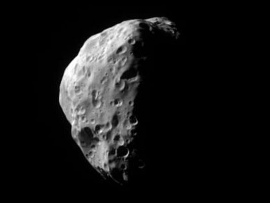 Epimetheus, from approx. 87.000 Km
Original caption:"How did Epimetheus form? No one is yet sure. To help answer that question, this small moon has recently been imaged again in great detail by the robot spacecraft Cassini now orbiting Saturn. Epimetheus sometimes orbits Saturn in front of Janus, another small satellite, but sometimes behind. The above false-color image, taken during mid July, shows a surface covered with craters indicating great age. Epimetheus spans about 115 Km across. Epimetheus does not have enough surface gravity to restructure itself into a sphere".
Parole chiave: Saturn's Moons - Epimetheus