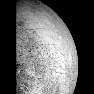 Europa's Leading Hemisphere
This image of Europa's Leading Hmisphere was obtained by the Solid State Imaging (CCD) System on board NASA's Galileo spacecraft during its seventh orbit of Jupiter. In the upper left part of the image is Tyre, a multi-ringed structure that may have formed as a result of an ancient impact. Also visible are numerous lineaments that extend for over 1000 Km. The limb, or edge, of Europa in this image can be used by scientists to constrain the radius and shape of the satellite. North is to the top of the picture and the Sun illuminates the surface from the right. The image, centered at -40° Latitude and 180° Longitude, covers an area approx. 2000 by 1300 Km. The finest details that can be discerned in this picture are about 6,6 Km across. The images were taken on April 3, 1997 at 17 h, 42', 19" Universal Time when the spacecraft was at a range of about 318.000 Km from Europa.
Parole chiave: Jupiter's moons - Europa