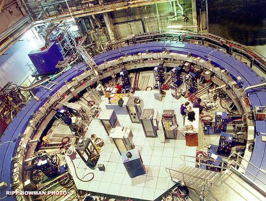 Another Universe behind our Universe?
How fast do fundamental particles wobble? A surprising answer to this seemingly inconsequential question has come out of Brookhaven National Laboratory in New York, USA and may not only indicate that the Standard Model of Particle Physics is incomplete but also that our universe is filled with a previously undetected type of fundamental particle. Specifically, the muon, a particle with similarities to a heavy electron, has had its relatively large wobble under scrutiny since 1999 in an experiment known as g-2 (gee-minus-two), pictured above. The result has galvanized other experimental groups around the world to confirm it, and pressures theorists to better understand it. The rate of wobble is sensitive to a strange sea of virtual particles that pop into and out of existence everywhere. The unexpected wobble rate may indicate that this sea houses virtual particles that include nearly invisible supersymmetric counterparts to known particles. If so, a nearly invisible universe of real supersymmetric particles might exist all around us.
Parole chiave: Theoretical Physics