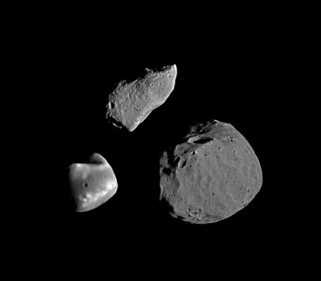 Gaspra, Deimos and Phobos
Caption NASA originale:"This montage shows asteroid 951 Gaspra (top) compared with Deimos (lower left) and Phobos (lower right), the moons of Mars. The three bodies are shown at the same scale and nearly the same lighting conditions. Gaspra is about 17 Km (10 miles) long. All three bodies have irregular shapes, due to past catastrophic conditions. However their surfaces appear remarkably different, possibly because of differences in composition but most likely because of very different impact histories. The Phobos and Deimos images were obtained by the Viking Orbiter spacecraft in 1977; the Gaspra image is the best of a series obtained by the Galileo spacecraft on October 29, 1991". 
Parole chiave: Asteroids: images from Space - Mosaic