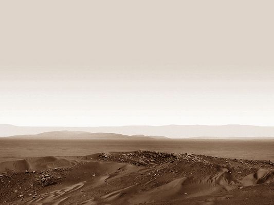 Gusev Crater: an artistic interpretation
"...The landing site and the Columbia Hills are within Gusev Crater, a bowl about 150 Km (about 95 miles) in diameter. It was selected for the Spirit mission because the shape of the terrain suggests the crater once held a lake. Volcanic deposits appear to have covered any sign of ancient lakebed geology out on the plain, but scientists say the hills expose older layers that have been lifted and tipped by a meteorite impact or other event...".
"Spirit has climbed to the hilltop and looked over the other side, but NASA did not do this just to say we can do it. The Mars rovers are addressing fundamental questions about Martian history and planetary environments," said NASA's Mars Exploration Program Director Doug McCuistion.

The crest of "Husband Hill" offers Spirit's views of possible routes into a basin to the south with apparently layered outcrops. Shortly after Spirit landed, it observed a cluster of seven hills about 3 kilometers (2 miles) east of its landing site. NASA proposed naming the range "Columbia Hills" in tribute to the last crew of Space Shuttle Columbia. The tallest of the hills commemorates Rick Husband, Columbia's commander.

Parole chiave: Artistic Views of the Solar System