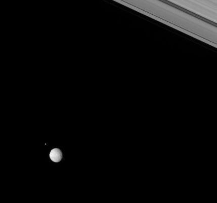Celestial Wonders around Saturn: Helene and Mimas
Caption NASA:"Mimas (397 Km, or 247 miles across) is seen here just before gliding in front of Helene (32 Km, or 20 miles across), which lays about 192.000 Km (approx. 119.000 miles) in the distance beyond the larger moon. 
The limb of Mimas is flattened in the West, where the rim if the large crater Herschel lies. 
This view looks toward the lit side of the Rings from about 3° below the Ring-Plane. 

The image was taken in visible light with the Cassini spacecraft narrow-angle camera on Feb. 3, 2007 at a distance of approx. 1,3 MKM (about 800.000 miles) from Mimas and 1,5 MKM (approx. 1 MMs) from Helene. 
Image scale is roughly 8 Km (approx. 5 miles) per pixel on Mimas and 9 Km (about 6 miles) per pixel on Helene". 
Parole chiave: Saturn's Moons - Helene and Mimas