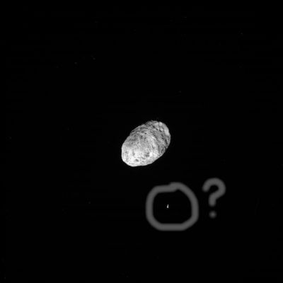 Hyperion and a "Bright Companion" (1 - context image)
Un'immagine bella ed ambigua: Hyperion, the "tumbling moon", sembra essere in compagnia di un altro oggetto il quale, forse perchè molto (si direbbe "troppo", a giudicare dal risultato fotografico ottenuto) luminoso, è stato "washed away".

Ma attenzione: il washing è stato solo parziale! Qualcosa, infatti, sembra che la si riesca a vedere...
Parole chiave: Saturn's Moons - Hyperion (controversial)