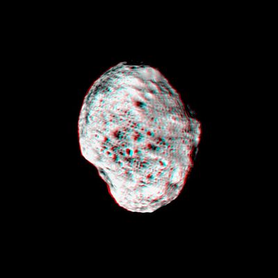 Stereo-Hyperion! (from about 176.000 Km)
Caption NASA originale:"Saturn's moon Hyperion pops into view in this stereo anaglyph (or 3D view) created from Cassini images. Images taken from slightly different viewing angles allow construction of such stereo views, which are helpful in interpreting the moon's irregular shape. 
Hyperion's unusual dimensions are 164 by 130 by 107 Km (such as 102 by 81 by 66 miles). 
Craters are visible on the moon's surface down to the limit of resolution in this image, about 1 Km (0,6 mile) per pixel. The fresh appearance of most of these craters, combined with their high spatial density, makes Hyperion look something like a sponge. The moon's spongy-looking exterior is an interesting coincidence, as Hyperion's density seems to indicate that it is porous and much of its interior is filled with voids. 
Dark material is concentrated in the bottoms of many craters visible here, perhaps resulting from the down slope movement of material, combined with sublimation of brighter ice".
Parole chiave: Saturn's Moons - Hyperion - 3D