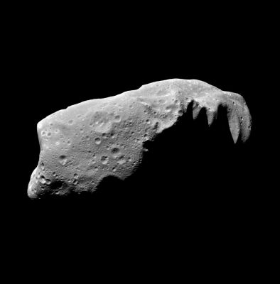 Asteroid Ida (HR)
This view of the asteroid 243 Ida is a mosaic of 5 image frames acquired by the Galileo spacecraft's solid-state imaging system at ranges of 3.057 to 3.821 Km on August 28, 1993, about 3-1/2 minutes before the spacecraft made its closest approach to the asteroid. Galileo flew about 2.400 Km from Ida at a relative velocity of 12.4 km/sec (28,000 mph). Asteroid and spacecraft were 441 million Km from the Sun. Ida is the second asteroid ever encountered by a spacecraft. It appears to be about 52 Km in length, more than twice as large as Gaspra, the first asteroid observed by Galileo in October 1991. Ida is an irregularly shaped asteroid placed by scientists in the S class (believed to be like stony or stony iron meteorites). It is a member of the Koronis family, presumed fragments left from the breakup of a precursor asteroid in a catastrophic collision. This view shows numerous craters, including many degraded craters larger than any seen on Gaspra.
Parole chiave: Asteroids: images from Space