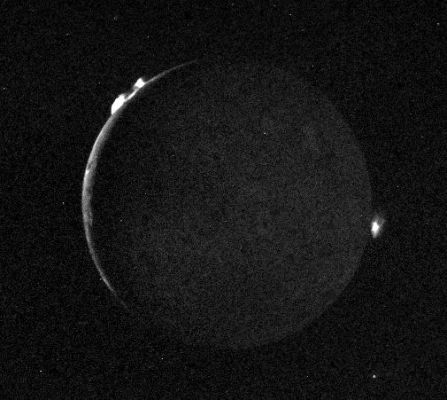 Flares and Eruptions on the limb of crescent Io
Un frame da ricordare, per bellezza ed importanza: ecco come appaiono le "flares" sul bordo di un pianeta in ombra. Sappiamo, in questo caso, che si tratta di eruzioni ed outgassing in corso e nessuno ne dubita. Tuttavia, quando fenomeni similari (o identici) vengono osservati sulla Luna, tutti (o quasi) gli Scienziati ed i Ricercatori si affrettano a dire che non è possibile e che deve trattarsi di sviste o bagliori da impatto. Ma perchè fa così paura l'idea che la Luna possa essere ancora in parte "viva"?

Voyager 2 took this picture of Io July 10, 1979, from a range of 1.2 million kilometers (750,000 miles). It was one of the last of an extensive sequence of "volcano watch" pictures planned as a time lapse study of the nearest of Jupiter's Galilean satellites. The sunlit crescent of Io is seen at the left, and the night side illuminated by light reflected from Jupiter can also be seen. Three volcanic eruption plumes are visible on the limb. All three were previously seen by Voyager 1. On the bright limb Plume 5 (upper) and Plume 6 (lower) are about 100 kilometers high, while Plume 2 on the dark limb is about 185 kilometers high and 325 kilometers wide. The dimensions of Plume 2 are about 1 1/2 times greater than during the Voyager 1 encounter, indicating that the intensity of the eruptions has increased during the four-month time interval between the Voyager encounters. The three volcanic eruptions and at least three others have apparently been active at roughly the same intensity or greater for a period of at least four months. 


Parole chiave: Jupiter's moons - Io