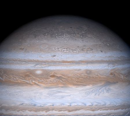 Jupiter's North Pole (HR)
Da "NASA - Picture of the Day" dell'11-09-2005:"Gas giant Jupiter is the Solar System's largest world with about 320 times the mass of Earth. Famous for its Great Red Spot, Jupiter is also known for its regular, equatorial cloud bands, also visible in very modest sized telescopes. 
The dark belts and light-colored zones of Jupiter's cloud bands are organized by the Planet's girdling winds which reach speeds of up to 500 Km/hour. On toward the Jovian poles though, the cloud structures become more mottled and convoluted until, as in this Cassini spacecraft mosaic of Jupiter, the Planet's Polar Region begins to look something like a brain. This striking equator-to-pole change in cloud patterns is not presently understood, but may be due in part to the effect of Jupiter's rapid rotation or to convection vortices generated at high latitudes by the massive Planet's internal heat loss. 
Cassini took this dramatically detailed view of Jupiter in December 2000, during its flyby enroute to Saturn".
Parole chiave: Jupiter