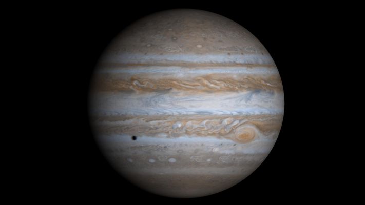 Jupiter, from Cassini
Original caption:"This true-color simulated view of Jupiter is composed of 4 images taken by NASA's Cassini spacecraft on December 7, 2000. To illustrate what Jupiter would have looked like if the cameras had a field-of-view large enough to capture the entire Planet, the cylindrical map was projected onto a globe. The resolution is about 144 Km (about 89 miles) per pixel. Jupiter's moon Europa is casting the shadow on the Giant Gas Planet".
Parole chiave: Jupiter
