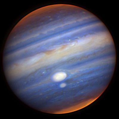 Colliding "Spots"
Caption NASA originale:"Two storms systems larger than Earth are nearly colliding right now on planet Jupiter. No one was sure what would happen, but so far both storms have survived. In the above false-color infrared image taken last week by the Gemini Observatory in Hawaii, the red spots appear white because their cloud tops tower above other clouds. Blue color represents lower clouds than white, while clouds colored red are the deepest. The smaller red spot, sometimes called Red Spot Jr. or just Oval BA, turned red earlier this year for reasons unknown. If both Jovian hurricanes continue to survive, they will surely pass near each other again in a few years since they revolve around Jupiter at different rates. Astronomers will continue to monitor Red Spot Jr. closely, however, to see if it will remain red when it rotates away from the larger Great Red Spot".
Parole chiave: From Earth Pictures - Professional Pictures