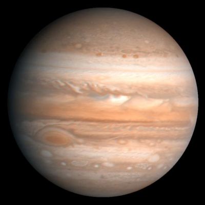Jupiter in full detail, by Voyager 2
Caption NASA originale:"The colors have been enhanced to bring out detail. Zones of light-colored, ascending clouds alternate with bands of dark, descending clouds. The clouds travel around the planet in alternating eastward and westward belts at speeds of up to 540 Km p/h. Tremendous storms as big as Earthly continents surge around the planet. The Great Red Spot is an enormous anticyclonic storm that drifts along its belt, eventually circling the entire planet". 
Parole chiave: Jupiter