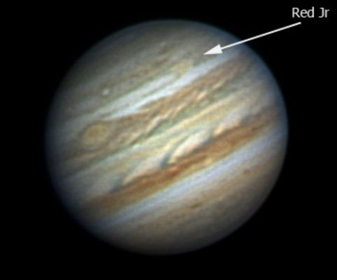 The "New Red Spot" of Jupiter
Jupiter's "Great Red Spot" is a swirling storm seen for over 300 years, since the begining of telescopic observations of the Solar System's ruling gas giant. But over the last month, the Great Red Spot has been joined by a new one (informally named "Red Spot Jr."). Thought to be similar to the Great Red Spot itself, this smaller Red Spot was actually seen to form as smaller whitish oval-shaped storms merged and then developed the remarkable reddish hue. This webcam image showing the two red tinted Jovian storms was recorded on the morning of March 12, 2006, from the Central Coast of New South Wales, Australia - part of a series showing Jupiter's rotation. Similar in diameter to planet Earth, Red Spot Jr. is expected to last for a while and trails the Great Red Spot by about an hour as the Planet rotates. Astronomers still don't exactly understand why Jupiter's red spots...are red.
Parole chiave: From Earth Images - Amatorial Images