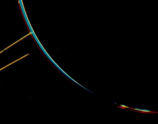 Colorful Jupiter's Rings
Caption NASA originale:"Jupiter's faint ring system is shown in this color composite as two light orange lines protruding from the left toward Jupiter's limb. This picture was taken in Jupiter's shadow through orange and violet filters. The colorful images of Jupiter's bright limb are evidence of the spacecraft motion during these long exposures. The Voyager 2 spacecraft was at a range of 1.450.000 kilometers about two degrees below the plane of the ring. The lower ring image was cut short by Jupiter's shadow on the ring itself".
Parole chiave: Jupiter's Rings