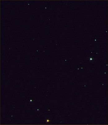 The "Jewel Box" (alias Kappa Crucis)
This image of part of the Jewel Box, an open star cluster, was acquired by the HiRISE camera, an instrument on the Mars Reconnaissance Orbiter, on December 14, 2005 as part of a calibration sequence while en route to the Red Planet. The Jewel Box was so named by Sir John Herschel because of the variety of star colors in the cluster, including the large red giant star seen near the bottom of this image. The Jewel Box, also called Kappa Crucis, is about 10 MY old, so it is much younger than our Sun which is about 4.600 MY old. This cluster lies about 7.500 LY away, so the light we see today left the stars in the Neolithic Ages of Earth, when farming was first being practiced by our ancestors.

HiRISE can image in three colors, green, red, and near-infrared, so the colors are not exactly as we see them with our eyes. 

The Jewel Box cluster lies in the Crux constellation, also called the Southern Cross, the most compact constellation in the sky.  
Parole chiave: From Space Images - Mars Reconnaissance Orbiter