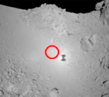 Target Marker located on Itokawa (2)
The spacecraft shifted to safe-hold mode because of its attitude dispersion during ascent, and Sagamihara Deep Space Control Room is now carrying out the recovery operation to three-axis control mode. 
It therefore takes a few more days to obtain detailed data relating the procedure. Instruments onboard are functioning very well so far. 
Spacecraft Hayabusa could find, on the surface of Itokawa, the Target Marker dropped on Nov. 20 among the images taken during descent phase on Nov. 26. 
On the Target Marker are etched 880.000 names from 149 Countries. 

The previous images show the area named "MUSES Sea" and they were taken at 04:58 of Nov. 20, 2005 (left) and at 06:24 of Nov. 26, 2005 (right). 
In this frame, the white light spot inside the red circle is the Target Marker with the 880.000 names!
Parole chiave: Asteroids