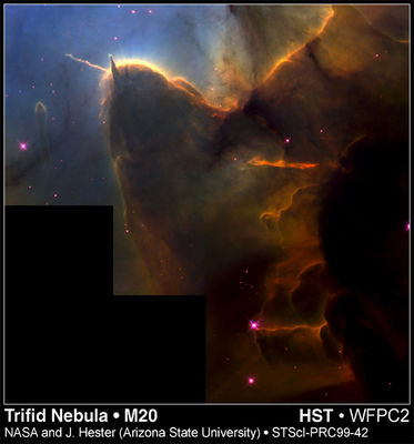 The dark profile of M 20 - The "Trifid Nebula"
"...Drama is Life with the dull bits left out..."

Alfred Hitchcock (1899-1980)
Parole chiave: Hubble Images