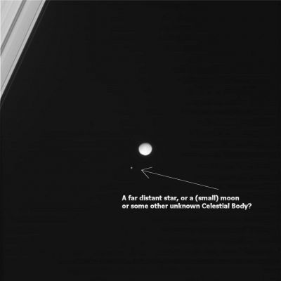 Occultation? (1)
La cosa più semplice da dire in sede di interpretazione di questo frame è che si dovrebbe trattare di una - davvero splendida - "occultazione", ossìa del transito di un Corpo Celeste sulla medesima linea visuale in cui si trova Mimas (dal punto di vista della Sonda Cassini) ed il susseguente verificarsi di una mini-eclisse.
Ma che cos'è il Corpo Celeste che viene "occultato" da Mimas? E' una stella? Secondo noi no, poichè le stelle, anche adoperando elevatissimi detail mgnf, non vengono risolte in maniera tale da mostrare dei dettagli superficiali. 
Questo oggetto, invece, anche senza usare uno stretch eccessivo, si risolve in un disco e "sembra" evidenziare lievi/tenui dettagli superficiali.
Si tratta dunque di un Corpo Celeste molto più vicino all'Osservatore di quanto non lo sarebbe una stella. Che cosa sarà? 
Con ogni probabilità, si tratta di un altra Luna Saturniana che, come già è accaduto tante volte in passato, viene colta in transito ravvicinato (un transito ravvicinato, come ovvio, solo apparente e determinato dal particolare movimento e relativo angolo visuale di Cassini) presso un'altra Luna del Gigante Anellato (pensate al bellissimo passaggio ravvicinato - con relativa occultazione - fra Rhea e Dione).

Oppure, se volete, si può anche pensare a qualcosa di più "esotico"...Vedete Voi!

Caption NASA:"(...) The camera was pointing toward Mimas that, at the time, was at approximately 1.345.535 Km away. and the image was taken using the CL1 and CL2 filters (...)". 
Parole chiave: Saturn's Moons - Mimas - Controversial