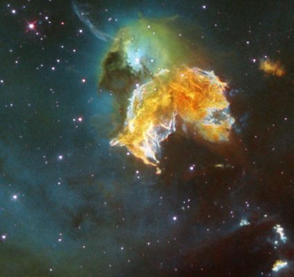 N63A - Supernova Remnant
What has this supernova left behind? As little as 2.000 years ago, light from a massive stellar explosion in the Large Magellanic Clouds (LMC) first reached planet Earth. The LMC is a close galactic neighbor of our Milky Way Galaxy and the rampaging explosion front is now seen moving out - destroying or displacing ambient gas clouds while leaving behind relatively dense knots of gas and dust. What remains is one of the largest supernova remnants in the LMC: N63A. Many of the surviving dense knots have been themselves compressed and may further contract to form new stars. Some of the resulting stars may then explode in a supernova, continuing the cycle. Pictured above is a close-up of one of the largest remaining knots of dust and gas in N63A taken by the orbiting Hubble Space Telescope. N63A spans over 25 light years and lies about 150.000 LY away toward the southern constellation of Dorado.
Parole chiave: From Space Images