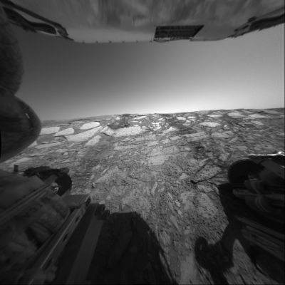 Going down, looking up! - Sol 134
Un'immagine che è già un "classico": mentre il Rover scende, la Rear Haz-Cam guarda verso l'alto, alle spalle di Opportunity, verso il sempre più lontano bordo del Cratere. I berries sono dappertutto; il cielo di Marte è sempre luminoso (o così pare...) e sgombro di nuvole. Con un pizzico di attenzione si possono già vedere le tracce delle ruote del Rover sulle lastre di pietra che adornano anche l'interno di Endurance Crater.

Caption NASA originale:"This view from the Mars Exploration Rover Opportunity’s Rear Hazard-Avoidance Camera looks back up toward the Endurance Crater's rim from the deepest point of a dip into the crater during the Rover's 134th Sol, on June 9, 2004. In this image, the Rover is pitched forward about 18° and the rear wheels are about 30 cm (about 12") below the rim of the Crater. The success of this engineering test of the slope and rock surface led Rover Planners to decide to proceed into the Crater for further scientific investigation".
Parole chiave: Endurance Crater