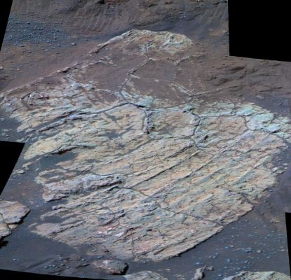 Escher Rock and the "paved walls" of Endurance - Sol 208 (false colors)
Caprtion NASA originale:"This false-color image taken by NASA's MER Opportunity shows a rock dubbed Escher on the southwestern slopes of Endurance Crater. Scientists believe the rock's fractures, which divide the surface into polygons, may have been formed by one of several processes. They may have been caused by the impact that created Endurance Crater, or they might have arisen when water leftover from the rock's formation dried up. A third possibility is that much later, after the rock was formed and after the crater was created, the rock became wet once again, then dried up and developed cracks. 
This image was taken on Sol 208 (Aug. 24, 2004) by the Rover's PanCam, using the 750-, 530- and 430-nnmt filters".
Parole chiave: Endurance Crater - Unusual inner features
