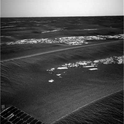 Ripple by ripple, trough by trough... - Sol 550 (2)
Original caption:"In the week from July 29 to August 3, Opportunity has driven an additional 80 mt (about 262 feet)and now Opportunity's odometer reads 5.696 mt (about 3,54 miles). 
As Opportunity continues a southward trek, Team Members are seeing more and more outcrops. Opportunity is still about about 50 mt (about 164 feet) north of the "Erebus highway" - an area the Team suspects to be highly populated with outcrop and perhaps easier to navigate. Opportunity is roughly 185 to 200 mt (approx. 607 to 656 feet) north of Erebus crater, the next large crater Opportunity will encounter".
Parole chiave: Mars Panorama - Martian Paving
