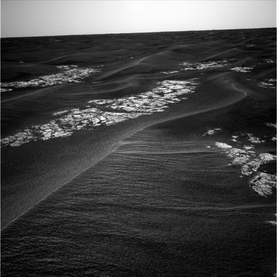 Ripple by ripple, trough by trough... - Sol 550 (3)
Original caption:"The Team has been watching Opportunity's power very carefully. It seems that Opportunity is losing some of the power boost it received during the last "cleaning event". The solar array wake up time has been getting later each day and is currently 9:48 MLT. 
The Team has been planning accordingly, taking steps to preserve power where appropriate".
Parole chiave: Mars Panorama - Martian Paving