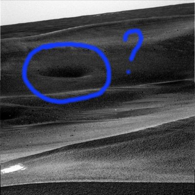 Dark, unusual, recent: a new crater "in the sands"?!? - Sol 668
Original caption:"Left Pan-Cam Non-linearized Full frame EDR acquired on Sol 668 of Opportunity's mission to Meridiani Planum at approx. 09:38:39 MLT. 
Camera commanded to use Filter 1 (739 nm)".
Parole chiave: Unusual surface feature - possible crater