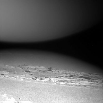 Meridiani's dawn (1) - Sol 673
Una serie di tre frames (diremmo non solo suggestivi, ma anche piuttosto inquietanti...) che ci mostra il rapido cambio di luminosità del cielo e della superficie di Marte, a mano a mano che si fa giorno. In realtà i tre frames (il primo in particolare) ci mostrano un curioso gioco di luci e d'ombre il quale rende abbastanza ben visibili e definiti i dintorni di Opportunity (ed infatti vediamo bene rocce e detriti), mentre tutto il resto del panorama, sino all'orizzonte, appare ancora immerso nella notte. Che si tratti, per una ennesima volta, di un effetto causato dai filtri/colore? Forse, ma la nostra sensazione è che, in questo caso, siamo semplicemente davanti ad un'alba su un mondo alieno e, quindi, un'alba "diversa" da quelle alle quali siamo abituati...

Original caption:"Left Pan-Cam Non-linearized Full frame EDR acquired on Sol 673 of Opportunity's mission to Meridiani Planum at approximately 08:22:21 MLT. Camera commanded to use Filter 2 (753 nm)".
Parole chiave: Martian Dawn - Meridiani Planum