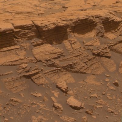 Layers at Payson outcrop - Sol 749
Caption originale:"The stack of fine layers exposed at a ledge called Payson, on the western edge of Erebus Crater in Mars' Meridiani Planum Region, shows a diverse range of primary and secondary sedimentary textures formed billions of years ago. These structures likely result from an interplay between windblown and water-involved processes. 

The PanCam on NASA's MER Opportunity acquired the exposures for this image on Spirit's 749th Sol (Feb. 10, 2006). This view is an approximately true-color rendering mathematically generated from separate images taken through all of the left PanCam's 432- to 753-nnmt filters". 
Parole chiave: Martian Outcrops - Payson - Erebus Area