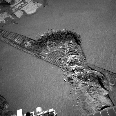 Soft, maybe too soft sands... (1) - Sol 835
Opportunity is less than 1 Km (just over half a mile) from Victoria Crater. During the last planned drive on Sol 833, the Rover became embedded in a soft dune. As designed, the drive was stopped by a slip check. 
The extraction process began on Sol 836, with 5 mt (about 16 feet) of commanded motion, and 9 cm (about 3,5") of actual forward progress. The results are encouraging, and extraction will continue on Friday (such as June 2, 2006) and over the weekend if necessary. Opportunity is otherwise healthy and continues to conduct atmospheric and targeted remote sensing on the path South.
Parole chiave: Martian Sands: controversial - Meridiani Planum