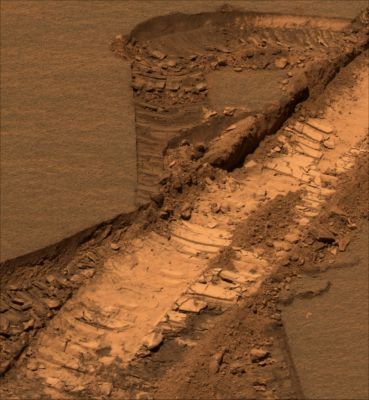 Jammerbugt (1) - Sol 842
Caption NASA originale:"This approximately true-color rendering was generated from images obtained by NASA's MER Opportunity on Sol 842 (such as June 7, 2006) using the PanCam's 600-, 530-, and 480-nnmt filters. 

As Winter has descended over Meridiani Planum, the availability of solar power for the Rover has diminished greatly. One consequence of less power for Opportunity is that there are fewer telecommunications links via the orbiting Mars Odyssey spacecraft because the Rover needs to use the "deep sleep" mode overnight to conserve energy. 
As a result, images that are not needed specifically to help plan the next sol of operations often stay onboard for a much longer time than the science team has been used to". 
Parole chiave: Martian Soil