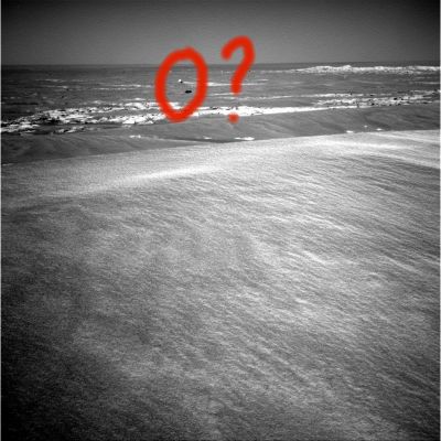 A "Menhir" in the distance?!? (context image) - Sol 871
Cerchiatura Rossa: difficile individuare un oggetto più bizzarro di questo che appare nei pressi del Beagle Crater...
Noi lo abbiamo chiamato "Menhir", ma anche "Dolmen" andrebbe bene. Di che cosa si tratta? Impossibile a dirsi da questa distanza ma, come vedrete nel detail mgnf che segue, l'oggetto proietta una spessa ed ampia ombra alle sue spalle.

Che dire? Se la sostanza sarà pari (o almeno equiparabile) all'apparenza, si potrà parlare - magari - del "Monolito di Meridiani Planum"...
Parole chiave: Highly Controversial Surface Structure - Opportunity Series