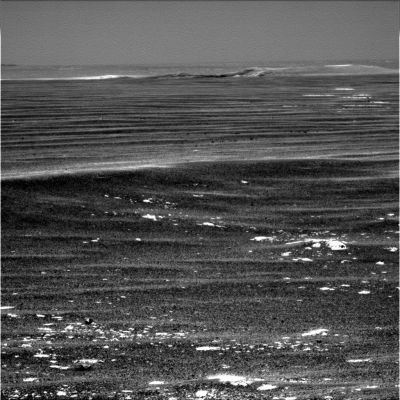 The rim of Victoria - Sol 939
Caption NASA originale:"Opportunity is healthy and is currently driving toward Victoria Crater, which is a little over 100 mt (328 feet) away. 
On sol 936 (such as Sept. 11, 2006), a short bump was made to a Robotic Arm (RA) rock target called "Cape Faraday" near the crater Emma Dean. Opportunity drove 1,45 mt (about 4,8 feet) between Soles 936/940".
Parole chiave: Martian Panorama - the rim of Victoria Crater