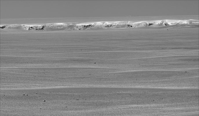 Only 50 meters away... (2) - Sol 943
Caption NASA originale:"Victoria Crater is about five times wider than Endurance Crater - which Opportunity spent six months examining in 2004 - and about 40 times wider than Eagle Crater, where Opportunity first landed. The great lure of Victoria is the expectation that a thick stack of geological layers will be exposed in the crater walls, potentially several times the thickness that was previously studied at Endurance and therefore, potentially preserving several times the historical record".
Parole chiave: Victoria Crater