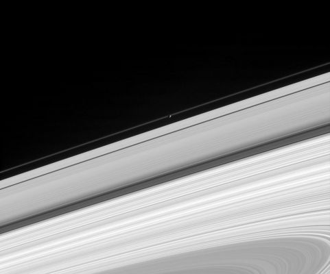 Occultation!
Original caption:"Saturn's moon Pandora glides in front of the narrow F-Ring, making the moon's oblong outline visible. The image also shows the A-Ring, the Cassini Division, the B-Ring and part of the C-Ring. This view is from beneath the Ring plane. The image was taken in visible light with the Cassini spacecraft narrow-angle camera on Aug. 23, 2005, at a distance of approximately 1,6 MKM (about 1 MMs) from Pandora and at a Sun-Pandora-spacecraft, or phase, angle of 97°. Resolution in the original image was 9 Km (about 6 miles) per pixel".
Parole chiave: Saturn's Moons - Pandora