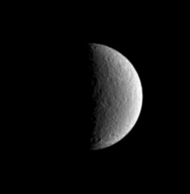 Tirawa impact basin on Rhea
Caption NASA originale:"The large Tirawa impact basin on Saturn's moon Rhea is visible at the two o'clock position in this Cassini image. This view shows principally the trailing hemisphere on Rhea and is centered on the moon's equator. North is up and tilted 25° to the left. 
The image was taken with the Cassini spacecraft narrow-angle camera on March 13, 2005, through a filter sensitive to wavelengths of ultraviolet light centered at 338 nnmts. 
The image was obtained at a distance of approximately 1,7 MKM(such as 1,1 MMs) from Rhea and at a phase angle of 90°. Resolution in the original image was 10 Km (approx. 6 miles) per pixel. The image has been contrast-enhanced and magnified by a factor of two to aid visibility".
Parole chiave: Saturn's Moons - Rhea