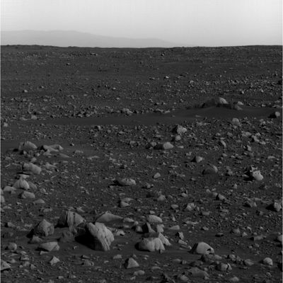 The rim of Gusev Crater - Sol 91 (1)
Caption NASA originale:"Spirit took this PanCam image on Sol 91 (April 5, 2004). Spirit is looking to the SouthEast and through the martian haze has captured the rim of Gusev crater, approximately 80 Km (such as 49,7 miles) away on the horizon. 
The right side of this image reveals the portion of the crater edge that descends into the mouth of Ma'adim Vallis, a channel that opens into Gusev crater. Spirit is currently traveling toward the "Columbia Hills," which lie to the left of the region pictured here. This image is similar to another PanCam image taken on Sol 68, but Gusev's ridge is more visible here because the atmospheric dust caused by Winter dust storms has settled. Scientists expect to get even clearer images than this one in upcoming Soles".
Parole chiave: Mars Panorama - Gusev Crater