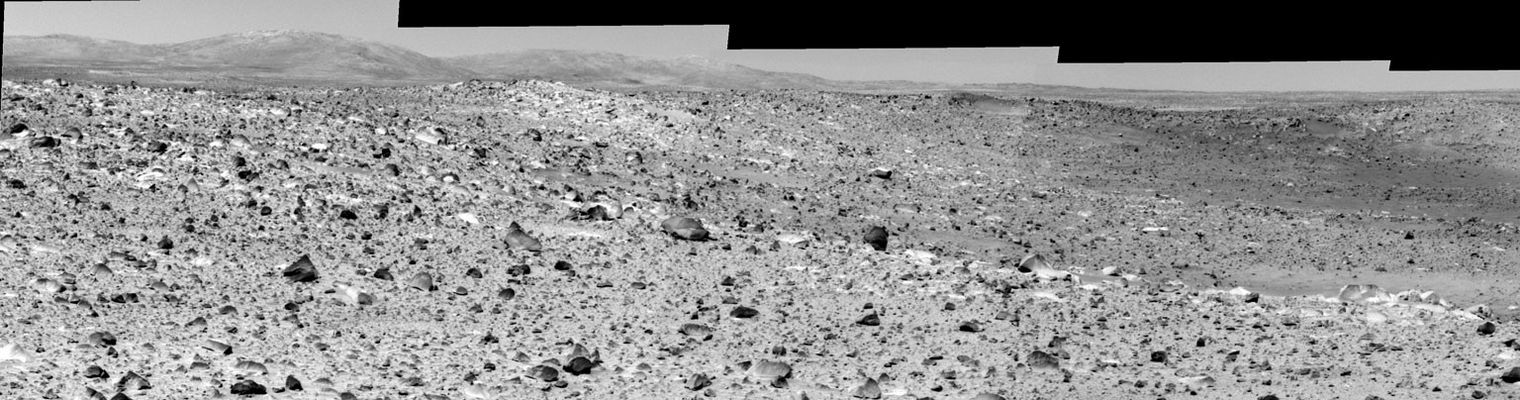 Missoula Crater Panorama in HR (1) - Sol 114
Caption NASA originale:"This mosaic was assembled from images taken by the PanCam on the MER Spirit at a region dubbed 'Site 31' and Spirit is looking at Missoula Crater. 
From orbit, the features within the Crater appeared to be ejecta from the younger Bonneville Crater, but Spirit's closer look revealed wind-blown drift deposits, not ejecta, within Missoula Crater".

Complimenti alla NASA: si mette in evidenza l'errore di interpretazione sul contenuto di Missoula Crater (depositi sabbiosi causati dal vento - "wind-blown drift deposits" - e NON ejecta dal più recente Bonneville Crater), mentre viene allegramente ignorato il fatto che, sempre dall'orbita, la profondità e le dimensioni di Missoula appaiono solo di poco inferiori a quelle di Bonneville quando invece, a giudicare dalle immagini riprese dalla superficie, Bonneville si caratterizza come un cratere vero e proprio mentre Missoula è solo una modesta depressione del suolo che si riesce a malapena a distinguere dal resto del paesaggio.
Parole chiave: Mars craters - Missoula Crater
