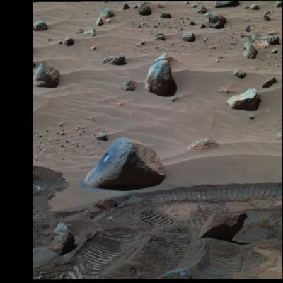 Wishstone - Sol 342 (False Colors)
Scientists working with NASA's Mars Exploration Rover Spirit decided to examine this rock, dubbed "Wishstone," based on data from the miniature thermal emission spectrometer. That instrument's data indicated that the mineralogy of the rocks in this area is different from that of rocks encountered either on the plains of Gusev Crater or in bedrock outcrops examined so far in the "Columbia Hills" inside the crater. Spirit used its rock abrasion tool first to scour a patch of the rock's surface with a wire brush, then to grind away the surface to reveal interior material. Placement of the rover's alpha particle X-ray spectrometer on the exposed circle of interior material revealed that the rock is rich in phosphorus. 
Parole chiave: Mars rocks, sand and debris