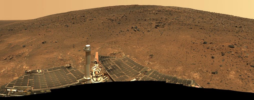 Mars Panorama: photomosaic - Sol 536/543 (2)
Original NASA caption:"During the 8 Soles that it took to acquire this image, the lighting varied considerably, partly because of imaging at different times of each Sol and partly because of small Sol-to-Sol variations in the dustiness of the atmosphere. These slight changes produced some image seams and rock shadows. These seams have been eliminated from the sky portion of the mosaic to better simulate the vista a person standing on Mars would see. However, it is often not possible or practical to smooth out such seams for regions of rock, soil, rover tracks or solar panels. 
Such is the nature of acquiring and assembling large panoramas from the rovers".
Parole chiave: Postcards from Mars - Mars Panorama