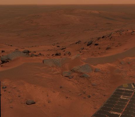 Tennessee Valley: View from Husband's Summit (1)
Original NASA caption:"This postcard or 2-inch mini-panorama was taken by NASA's Spirit Rover on Sol 582 (August 23, 2005), just as the Rover finally completed its intrepid climb up Husband Hill. The Summit appears to be a windswept plateau of scattered rocks, little sand dunes and small exposures of outcrop. The breathtaking view here is toward the North, looking down into the drifts and outcrops of the 'Tennessee Valley', a Region that Spirit was not able to visit during its climb to the top of the hill. 
The approximate true-color postcard spans about 90° and consists of images obtained by the Rover's PanCam during 18 individual pointings. At each pointing, the Rover used three of its panoramic filters (600, 530 and 480 nanometers)".
Parole chiave: Postcards from Mars - Mars Panorama