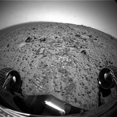 Spirit Status on Sol 598
Spirit is in good health, power positive and has no issues. This week the telecom team changed Spirit's uplink rate from 1000 to 2000 bps. In its orbit around the Sun, Mars comes close to Earth for a few months once every 2 years. Mars is now close enough to Earth that the one-way communication travel time from the spacecraft at Mars to the Deep Space Network antennas on Earth is only about 5' away (at light speed). This shorter communication travel time means that the Rover Team has plenty of communication-link margin to support the higher uplink rate. The new uplink rate was successful during the Sol 598 uplink session. Between Sept. 2 and Sept. 8, Spirit drove to another imaging location and completed the second stereo imaging campaign then returned to "Irvine" in order to explore what might be a dike, which is a crack-like cut that often forms when magma from a volcano travels through or over another rock. Spirit also performed more observations of the Martian Moons and completed 3 days of Mössbauer spectrometer readings on the capture magnets.
Parole chiave: Mars Panorama - Mars rocks, sand and debris