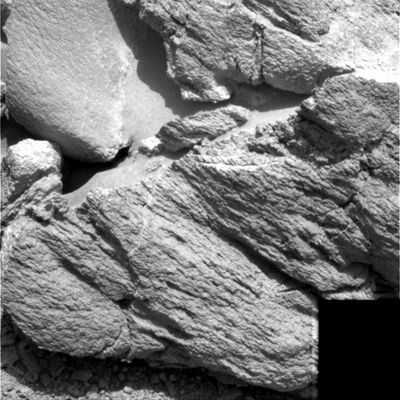 The rocks of "Hillary Outcrop" (1) - Sol 634
NASA - Official Status Report:"Spirit is healthy and spent the week examining a rock called Hillary at the true summit of Husband Hill. 
The first attempt to approach Hillary ended with a small pebble under Spirit's left front wheel, and the stability of the Rover was uncertain. 
A set of wheel wiggles was performed to stabilize the Rover before deployment of the Robotic Arm (RA). Once the wheel was in good contact with the ground, Spirit began a conservative RA campaign that started with Mössbauer Spectrometer and Alpha Particle X-ray Spectrometer integrations".
Parole chiave: Mars rocks, sand and debris - Hillary Outcrop