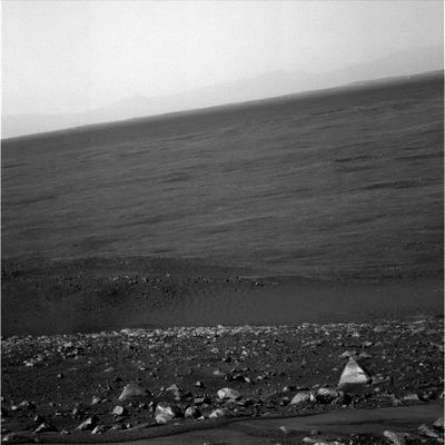 Time to go down... (1) - Sol 635
Original caption:"Spirit is healthy and has begun driving downhill from the top of Husband Hill toward the South Basin. Elevation maps produced from the PanCam imagery taken at and near the summit of Husband Hill showed a safe traverse (with vehicle tilts under about 20°) across ridge lines east of the Summit. These ridge lines (informally called "Haskin Upper Ridge" and "Haskin East Ridge") are the planned traverse paths for coming weeks. When possible, Spirit will drive each day".
Parole chiave: Mars Panorama