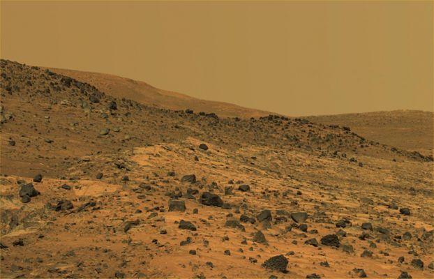 Home Plate: almost true colors and HR (1) - Sol 758
On Feb. 19, 2006 - such as the 758th Martian day of exploration of the Red Planet by NASA's MER Spirit - the Rover acquired this panoramic view of the interior of Home Plate, a circular topographic feature amid the Columbia Hills. 
This view, called the "Paige" panorama, is from the top of Home Plate. It shows layered rocks exposed at the edge as well as dark rocks exhibiting both smooth and sponge-like "scoriaceous" textures. To the East from this vantage point, McCool Hill looms on the horizon. At the base of McCool Hill is a reddish outcrop called Oberth, which Spirit may explore during the rapidly approaching Martian Winter. Von Braun and Goddard hills are partially visible beyond the opposite rim of Home Plate. 
Parole chiave: Mars Panorama - Home Plate Area