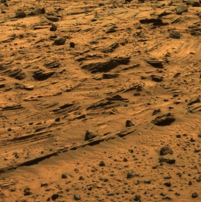 Home Plate: almost true colors and HR - Sol 774
The layered nature of these rocks presents new questions for the Rover Team. In addition to their chemical properties, which scientists can study using Spirit's spectrometers, these rocks record a detailed history of the physical properties that formed them. In the center of this image, one group of layers slopes downward to the right. The layers above and below this group are more nearly horizontal. Where layers of different orientations intersect, other layers are truncated. This indicates that there were complex patterns of alternating erosion and deposition occurring when these layers were being deposited. Similar patterns can be found in some sedimentary rocks on Earth. Physical relationships among the various layers exposed at Home Plate are crucial evidence in understanding how these Martian rocks formed. Scientists suspect that the rocks at Home Plate were formed in the aftermath of a volcanic explosion or impact event, and they are investigating the possibility that wind may also have played a role in redistributing materials after such an event.

Images like this one from Panoramic Camera (PanCam), which shows larger-scale layering, as well as those from the Microscopic Imager (MI), which reveal the individual sand-sized grains that make up these rocks, are essential to understanding the geologic history of Home Plate. 

This view is an Approximately True Color rendering that combines separate images taken through the PanCam's 753-, 535- and 432-nanometer filters, during Spirit's 774th Sol (such as March 8, 2006).
Parole chiave: Martian Surface - Home Plate layers