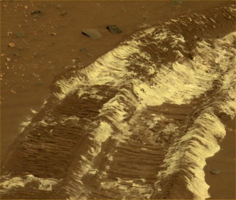 Saltland, in natural colors (1) - Sol 788
Caption NASA originale:"While driving Eastward toward the North-Western flank of McCool Hill, the wheels of NASA's MER Spirit churned up the largest amount of bright soil discovered so far in the Mission. This image from Spirit's PanCam, taken on Sol 788 (such as March 22, 2006), shows the strikingly bright tone and large extent of the materials uncovered. 
Several days earlier, Spirit's wheels unearthed a small patch of light-toned material informally named Tyrone. In images from Spirit's PanCam, Tyrone strongly resembled both Arad and Paso Robles, two patches of light-toned soils discovered earlier in the Mission. 
Spirit found Paso Robles in 2005 while climbing Cumberland Ridge on the Western slope of Husband Hill. In early January 2006, Spirit discovered Arad on the basin floor just South of Husband Hill. Spirit's instruments confirmed that those soils had a salty chemistry dominated by iron-bearing sulphates".
Parole chiave: Martian Surface - possible salt and sulphate underground deposits