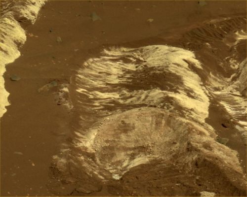 Saltland, in natural colors (2) - Sol 788
Caption NASA originale:"Spirit's PanCam and Miniature Thermal Emission Spectrometer examined this most recent discovery, and researchers will compare its properties with the properties of those other deposits. 
These discoveries indicate that salty, light-toned soil deposits might be widely distributed on the flanks and valley floors of the Columbia Hills Region in Gusev Crater. 
The salts, which are easily mobilized and concentrated in liquid solution, may record the past presence of water. So far, these enigmatic materials have generated more questions than answers, however, and as Spirit continues to drive across this Region in search of a safe Winter haven, the team continues to formulate and test hypotheses to explain the Rover's most fascinating recent discovery. 

This view is an approximately true-color rendering that combines separate images taken through the PanCam's 753-, 535- and 432-nanometer filters".
Parole chiave: Martian Surface - possible salt and sulphate underground deposits