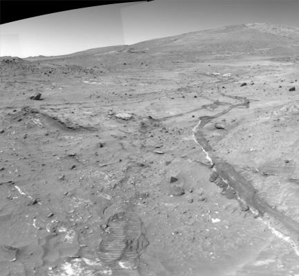 Spirit's Winter Haven: the surroundings (2)
Caption NASA originale:"The planned subsurface soil experiments will be a first for the Mars Exploration Rover Mission. To conduct the study, Spirit will use the brush on the Rock Abrasion Tool (RAT) to carefully sweep away soil, much the way an archaeologist uses a brush to uncover artifacts. At each level, Spirit will measure the mineral and chemical properties and assess the physical nature (such as grain size, texture, hardness) of the material, using the Athena Science Instruments on the Robotic Arm (RA). Of particular interest are vertical variations in soil characteristics that may indicate water-related deposition of sulfates and other minerals".
Parole chiave: Mars Panorama